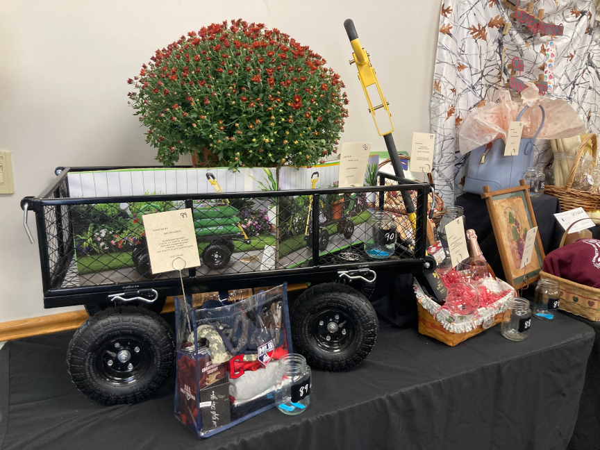 One of the raffle basket prizes was a large garden wagon with tools and mums inside. One lucky winner took this home that evening.